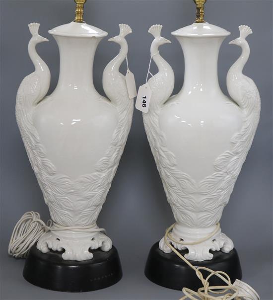 A pair of white glazed peacock table lamps height 50cm (one a.f.)